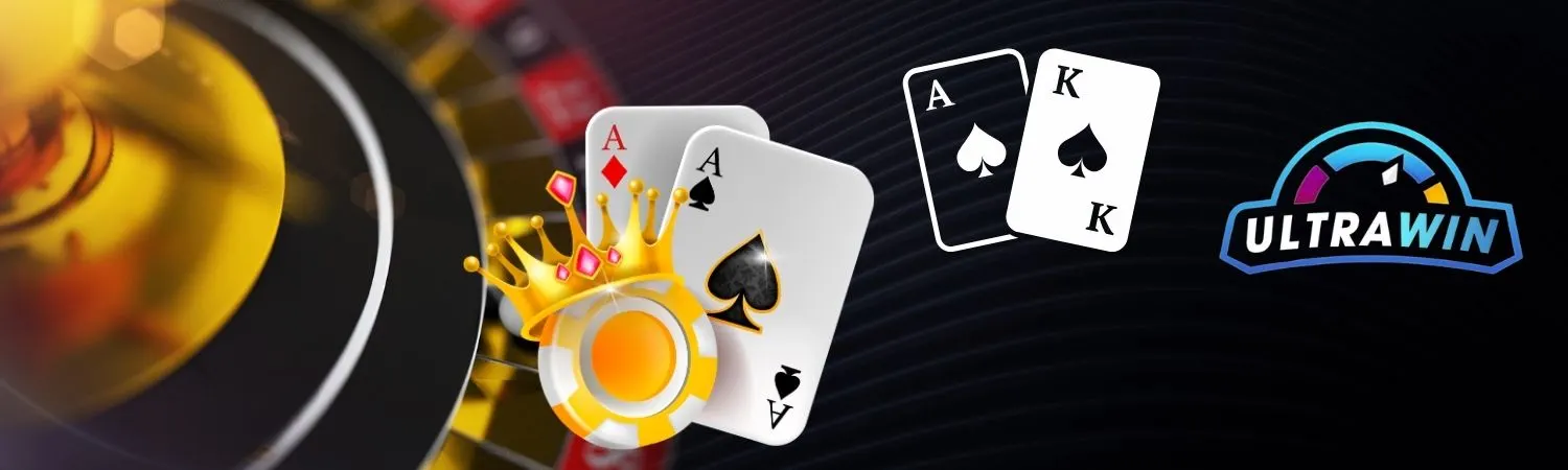 Roulette wheel with playing cards and royal coin featuring crown symbolizing elite casino play on UltraWin